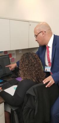 Jose Franceschini, practice administrator with CUIMC's Department of Medicine, Division of Digestive and Liver Diseases, with Chanel Peace.